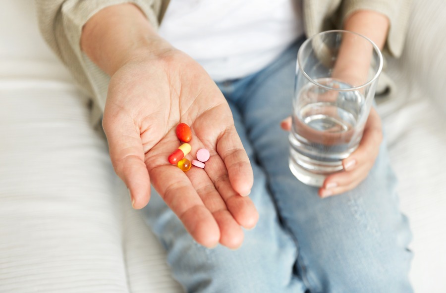 woman-taking-pill-medication