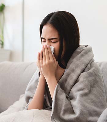 woman sick with flu