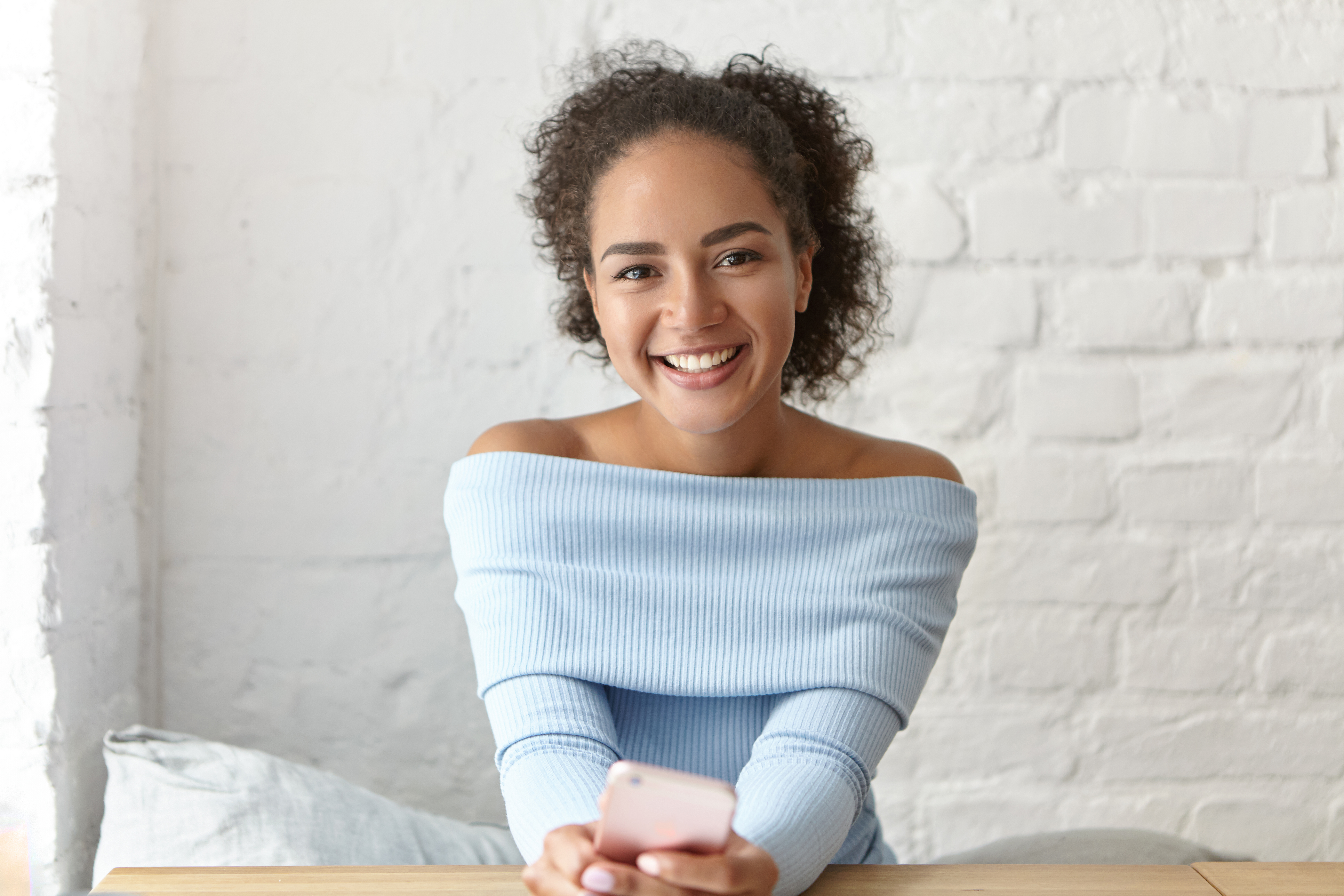 beautiful-woman-cafe happy-girl-sitting-at-table