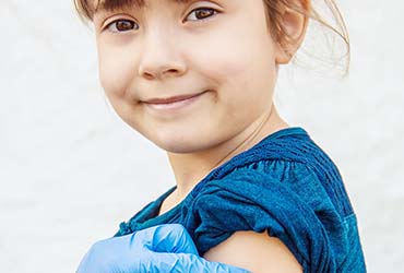 child getting a flu vaccine