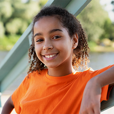 teenager-girl-having-fun-summer smiling girl